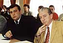 Mikael Grigoryan, counselor to the Minister of Internal Affairs of Armenia, and Hovhannes Kocharyan, lecturer at the Academy of Internal Affairs, follow proceedings